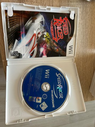 Nintendo Wii + 8 juegos + Guitarra
