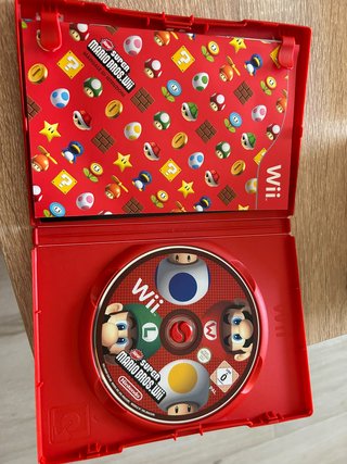 Nintendo Wii + 8 juegos + Guitarra