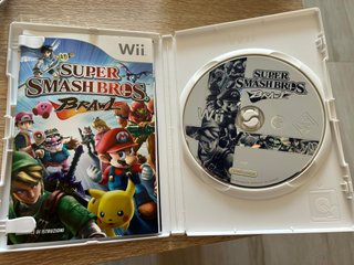 Nintendo Wii + 8 juegos + Guitarra