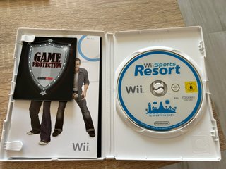 Nintendo Wii + 8 juegos + Guitarra