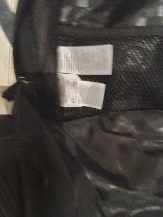 Mochila Vans negra con flor