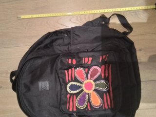Mochila Vans negra con flor