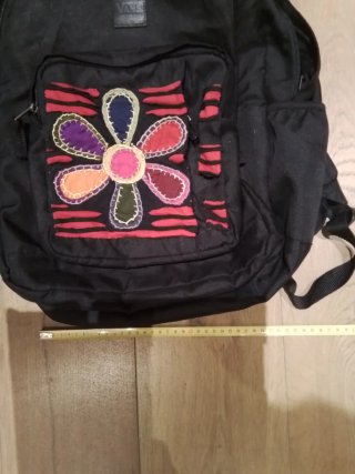 Mochila Vans negra con flor