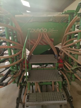 Abonadora, sembradora, rulo y tractor pala