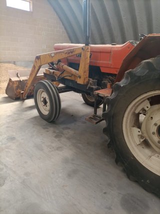 Abonadora, sembradora, rulo y tractor pala