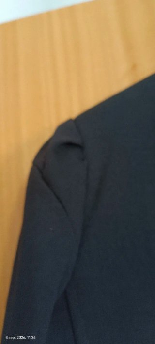 Chaqueta estilo militar negra con botones