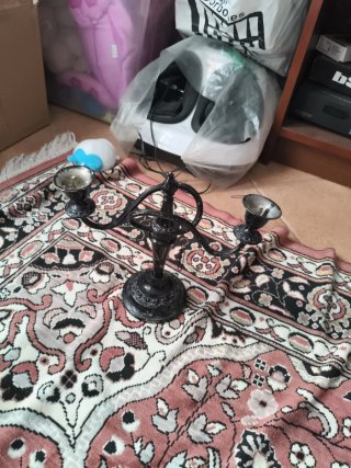 Candelabro antiguo de metal