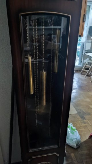 Reloj de péndulo de madera