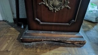 Reloj de péndulo de madera