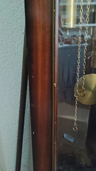 Reloj de péndulo de madera