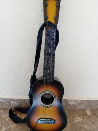 Guitarra de juguete negra