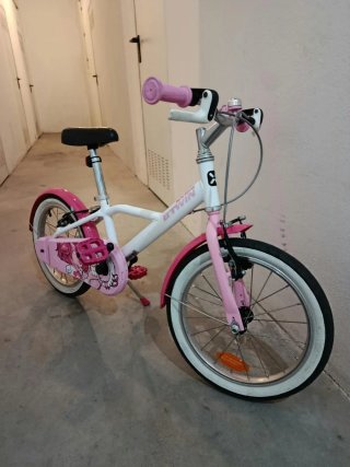 Bicicleta infantil rosa y blanca