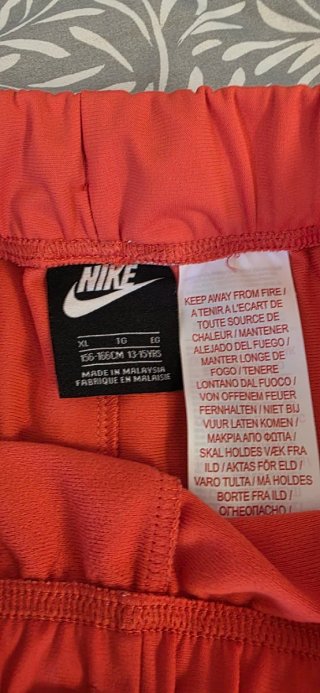 Pantalón deportivo niño Nike naranja