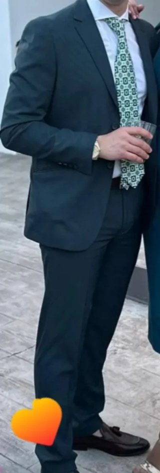 Traje de hombre verde oscuro
