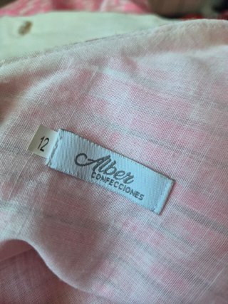 Vestido rosa con cinturón y flor 12 años