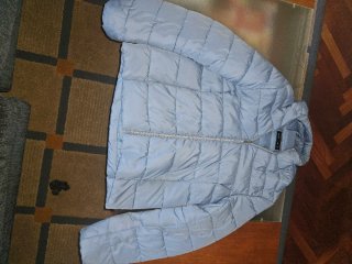 Plumífero azul acolchado