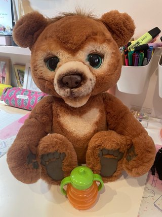 Oso de peluche con biberón