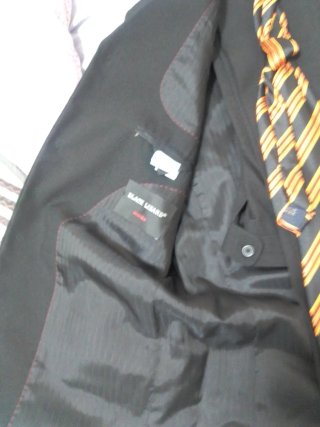 Traje de vestir negro chaqueta pantalón corbata