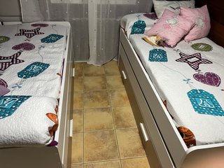 Cama nido beige y blanca