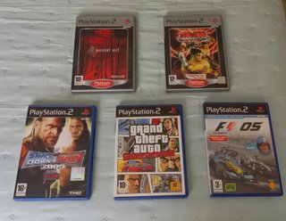 PACCHETTO PS2 SLIM CON SCATOLA ORIGINALE + 7 GIOCHI + 2 COMANDI