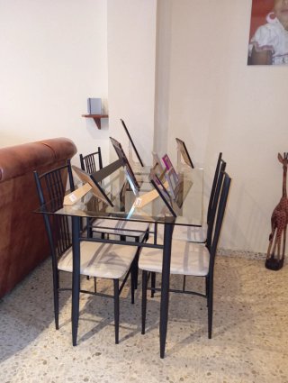 Mesa cristal y 4 sillas forja