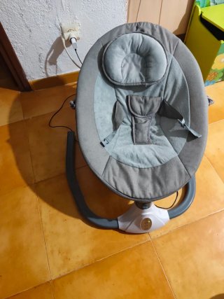 Hamaca bebé con capota y juguetes