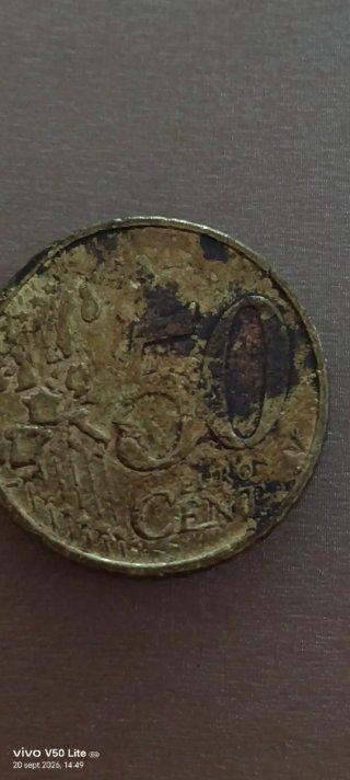 Moneda 2002 defectuosa