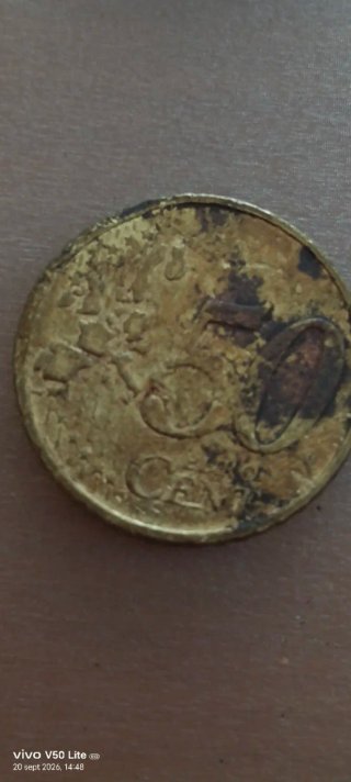 Moneda 2002 defectuosa