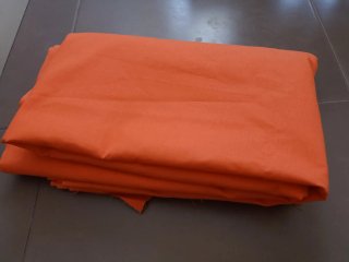 Tela naranja teja tipo algodón.  Medidas 6,5 x 1,4