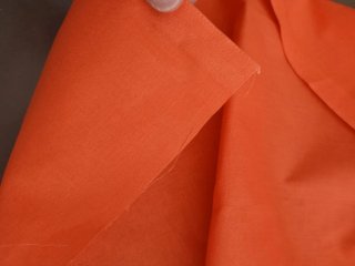 Tela naranja teja tipo algodón.  Medidas 6,5 x 1,4
