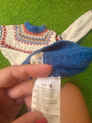 Jersey de punto con cuello alto y estampado