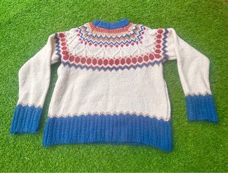 Jersey de punto con cuello alto y estampado