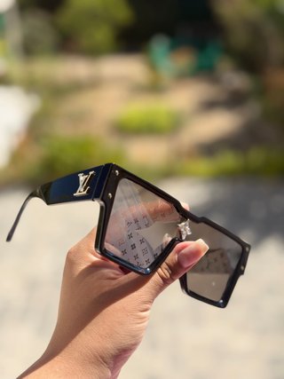Gafas de sol Louis Vuitton negras y doradas