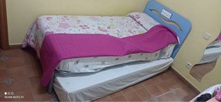 Cama con cabecero