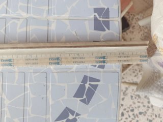 Burlete bajo puerta adhesivo blanco 1m