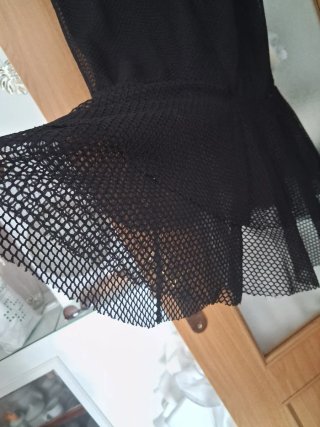 Falda rejilla con volantes negra
