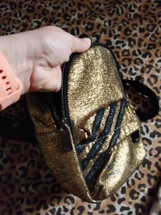 Mini mochila dorada brillante
