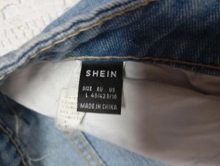 Pantalones vaqueros anchos rotos