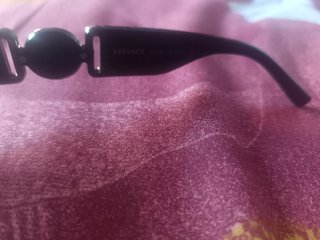 Gafas de sol Versace negras y doradas