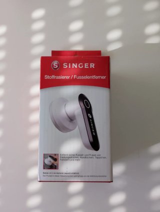 Quitapelusas Singer