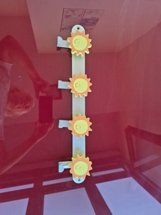 Perchero infantil sol