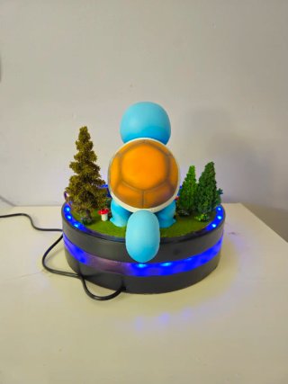Fuente de agua Pokémon con figuras