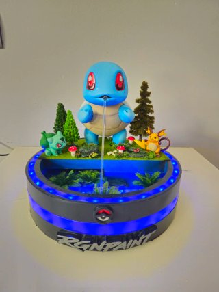 Fuente de agua Pokémon con figuras