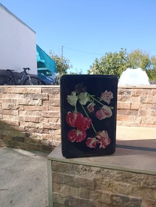 Lata antigua Cola-Cao Nutrexpa con flores