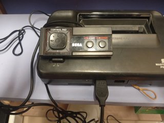 Sega Master System II con Castle of Illusion