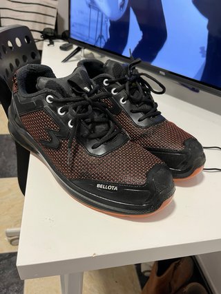 Zapatos de seguridad Bellota negros y naranjas
