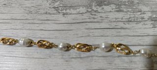 Pulsera de oro con perlas