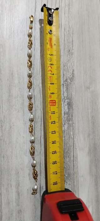 Pulsera de oro con perlas