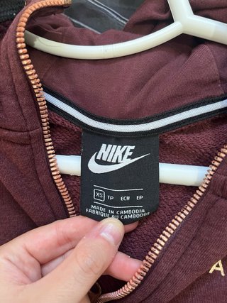 Chaqueta Nike Air con cremallera dorada