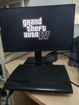 PlayStation 3 Superslim 500GB + 2 Mandos